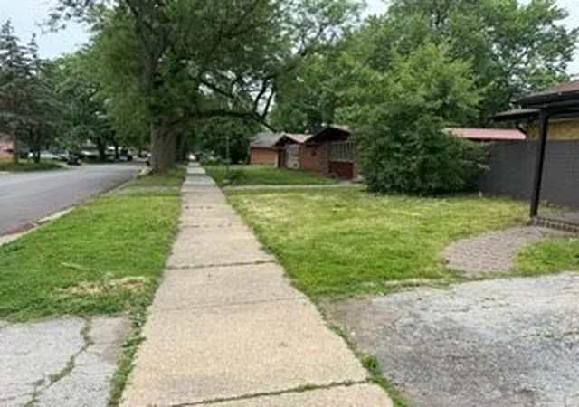 Photo 2 of Single family home for sale at 15122 Meadow Ln, Dolton, IL 60419 | MLS# 12736457 | Listing updated on 2026-09-22