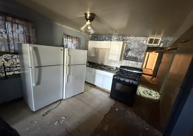 Photo 3 of Multi family home for sale at 4150 W Carroll Ave, Chicago, IL 60624 | MLS# 12737206 | Listing updated on 2026-09-12