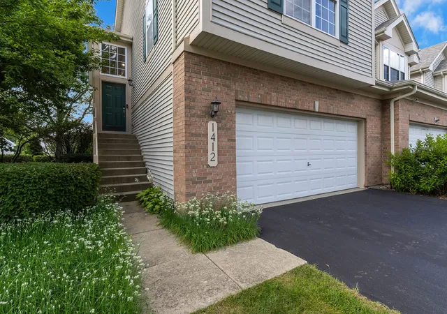 Photo 2 of Townhouse for sale at 1412 Quincy Brg Ct, Bartlett, IL 60103 | MLS# 12740338 | Listing updated on 2026-09-13