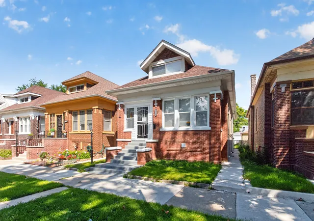 Photo 2 of Single family home for sale at 7715 S Eberhart Ave, Chicago, IL 60619 | MLS# 12740802 | Listing updated on 2026-09-03