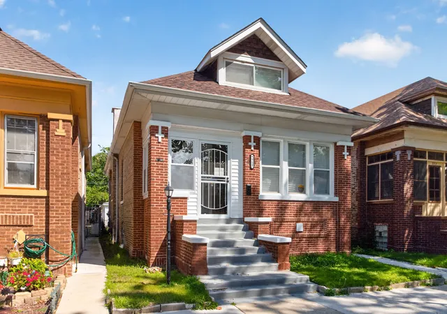 Photo 3 of Single family home for sale at 7715 S Eberhart Ave, Chicago, IL 60619 | MLS# 12740802 | Listing updated on 2026-09-03