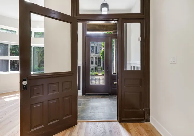Photo 2 of Single family home for sale at 4917 S Washington Park Ct, Chicago, IL 60615 | MLS# 12742136 | Listing updated on 2026-09-26