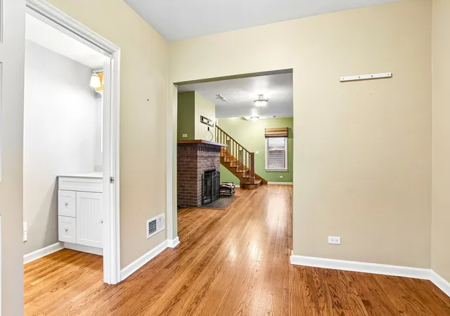 Photo 3 of Single family home for sale at 415 Douglas Ave, Waukegan, IL 60085 | MLS# 12742266 | Listing updated on 2026-10-20
