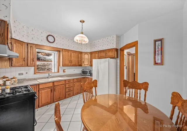 Photo 2 of Multi family home for sale at 4984 N Major Ave, Chicago, IL 60630 | MLS# 12746405 | Listing updated on 2026-09-24