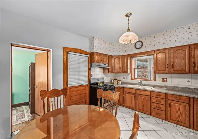 Photo 3 of Multi family home for sale at 4984 N Major Ave, Chicago, IL 60630 | MLS# 12746405 | Listing updated on 2026-09-24