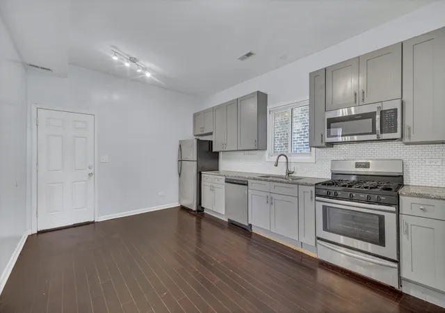 Photo 3 of Multi family home for sale at 4908 W Byron St, Chicago, IL 60641 | MLS# 12746673 | Listing updated on 2026-10-29