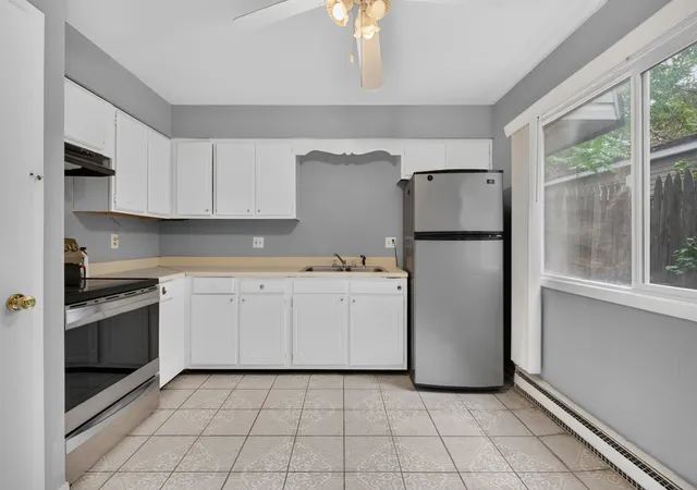 Photo 2 of Multi family home for sale at 217 219 Stuart Ave, Aurora, IL 60505 | MLS# 12746711 | Listing updated on 2026-09-19