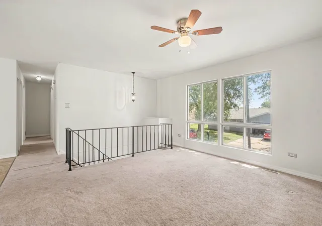 Photo 3 of Single family home for sale at 945 Surrey Ct, Joliet, IL 60431 | MLS# 12746931 | Listing updated on 2026-09-16