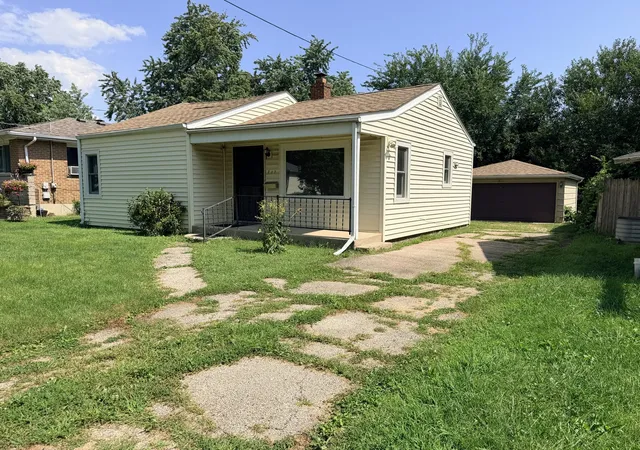Photo 1 of Single family home for sale at 717 N May St, Aurora, IL 60506 | MLS# 12747272 | Listing updated on 2026-09-24