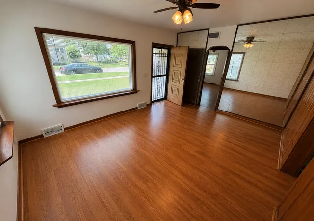 Photo 3 of Single family home for sale at 717 N May St, Aurora, IL 60506 | MLS# 12747272 | Listing updated on 2026-09-24
