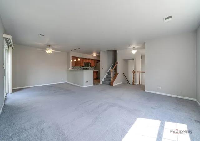 Photo 3 of Townhouse for sale at 1432 Hampshire Ct, Roselle, IL 60172 | MLS# 12749431 | Listing updated on 2026-09-12