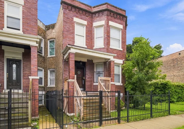 Photo 2 of Multi family home for sale at 4833 W Gladys Ave, Chicago, IL 60644 | MLS# 12749967 | Listing updated on 2026-09-21