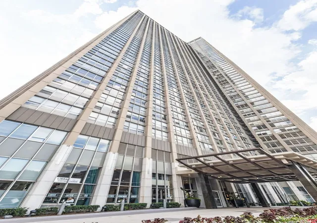 Listing Photo 1 - Condo for sale in building located at 655 W Irving Park Rd, Chicago, IL 60613 - Unit #702