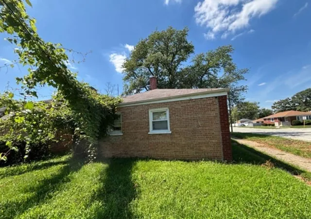 Photo 3 of Single family home for sale at 14301 Kimbark Ave, Dolton, IL 60419 | MLS# 12751071 | Listing updated on 2026-09-05