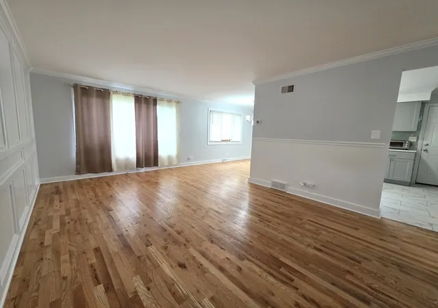 Photo 3 of Single family home for sale at 14820 Cottage Grv Ave, Dolton, IL 60419 | MLS# 12751107 | Listing updated on 2026-09-23