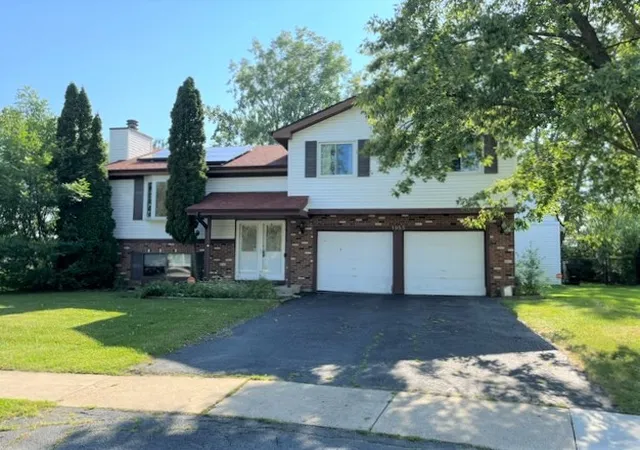 Photo 1 of Single family home for sale at 1955 Zeppelin Dr, Hanover Park, IL 60133 | MLS# 12751309 | Listing updated on 2026-10-06