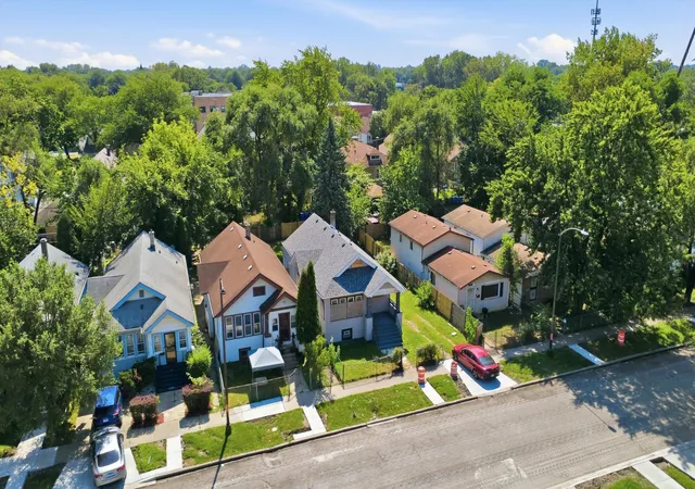 Photo 2 of Single family home for sale at 311 W 107th Street, Chicago, IL 60628 | MLS# 12752122 | Listing updated on 2026-09-14