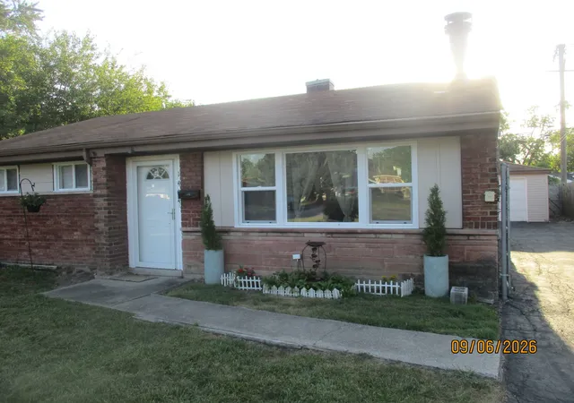 Photo 3 of Single family home for sale at 1404 Burnham Ave, Calumet City, IL 60409 | MLS# 12752344 | Listing updated on 2026-09-23