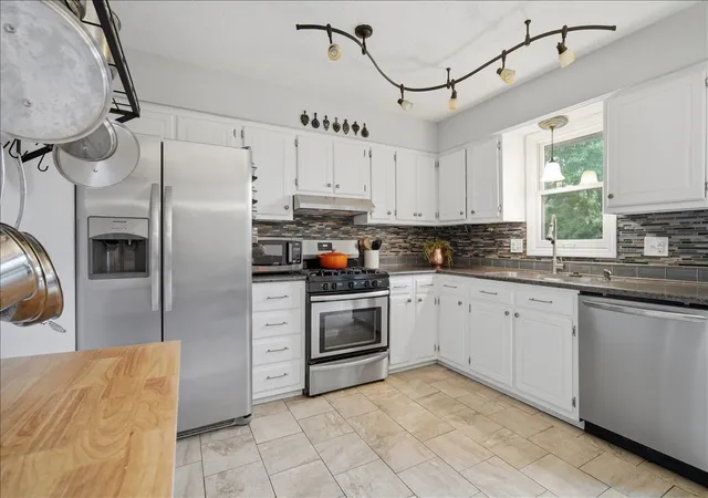 Photo 4 of Single family home for sale at 1416 N Hershey Rd, Bloomington, IL 61704 | MLS# 12752940 | Listing updated on 2026-09-12