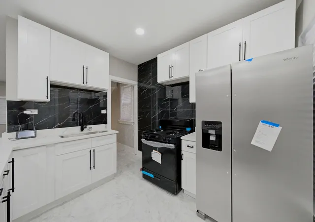 Photo 4 of Single family home for sale at 122 N Long Ave, Chicago, IL 60644 | MLS# 12753118 | Listing updated on 2026-09-14