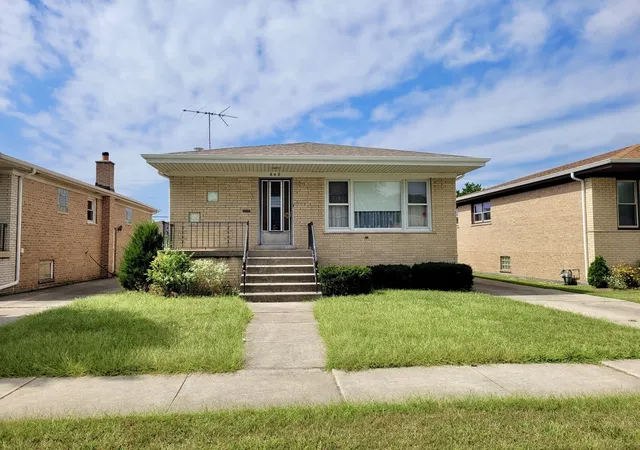 Single family home for sale at 648 Escanaba Ave, Calumet City, IL 60409 | MLS# 12753360