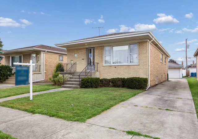Photo 1 of Single family home for sale at 648 Escanaba Ave, Calumet City, IL 60409 | MLS# 12753360 | Listing updated on 2026-09-23