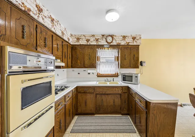 Photo 3 of Single family home for sale at 648 Escanaba Ave, Calumet City, IL 60409 | MLS# 12753360 | Listing updated on 2026-09-23