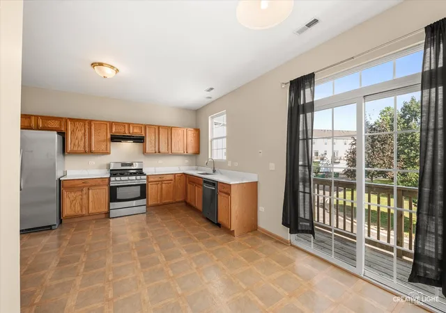 Photo 2 of Townhouse for sale at 277 S Oak Crk Ln, Romeoville, IL 60446 | MLS# 12753759 | Listing updated on 2026-09-14