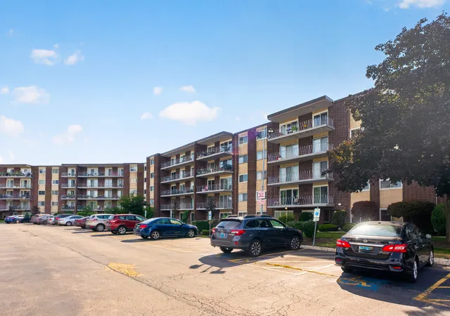 Photo 1 of Condo for sale at 2900 Maple Ave #14E, Downers Grove, IL 60515 | MLS# 12754300 | Listing updated on 2026-09-21