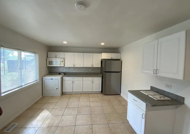 Photo 2 of Single family home for sale at 1429 Ambassador Ln, Ford Heights, IL 60411 | MLS# 12754375 | Listing updated on 2026-09-22