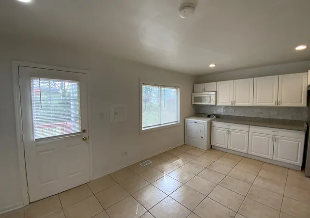 Photo 3 of Single family home for sale at 1429 Ambassador Ln, Ford Heights, IL 60411 | MLS# 12754375 | Listing updated on 2026-09-22