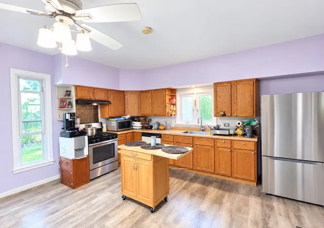 Photo 3 of Single family home for sale at 952 Larkin Ave, Elgin, IL 60123 | MLS# 12754700 | Listing updated on 2026-10-23