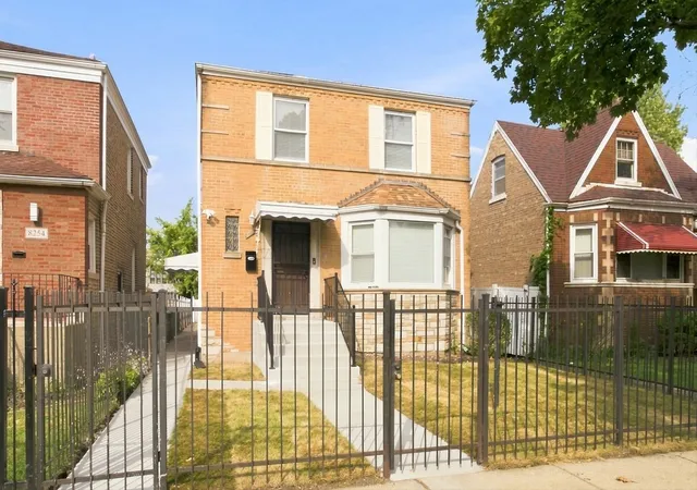 Photo 1 of Single family home for sale at 8252 S Marshfield Ave, Chicago, IL 60620 | MLS# 12754745 | Listing updated on 2026-09-15