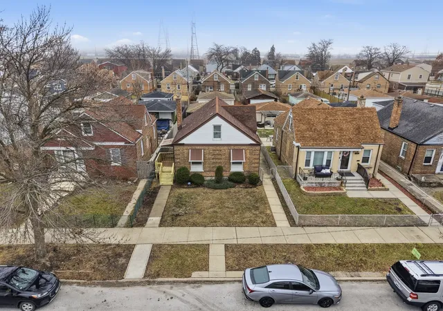 Photo 2 of Single family home for sale at 10941 S Ave C, Chicago, IL 60617 | MLS# 12754807 | Listing updated on 2026-09-15