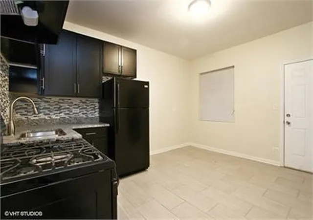 Photo 3 of Multi family home for sale at 8025 S Ada St, Chicago, IL 60620 | MLS# 12754850 | Listing updated on 2026-09-15