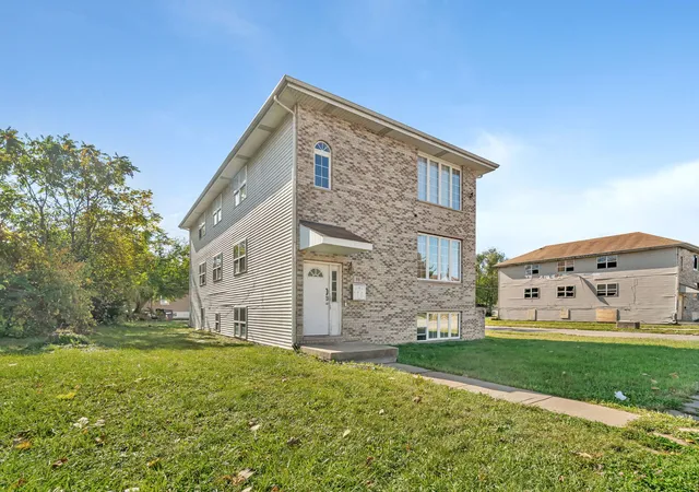 Photo 2 of Multi family home for sale at 98 W 154th Street, Harvey, IL 60426 | MLS# 12755273 | Listing updated on 2026-10-16
