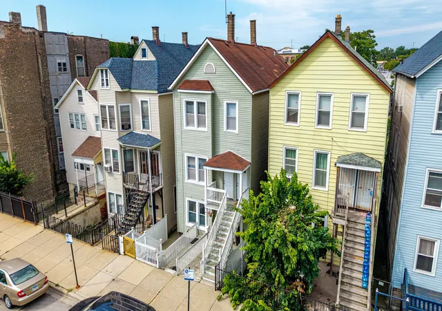 Photo 1 of Multi family home for sale at 9018 S Houston Ave, Chicago, IL 60617 | MLS# 12755495 | Listing updated on 2026-09-16