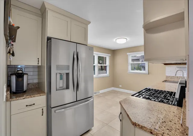 Photo 4 of Single family home for sale at 1402 S Robert Dr, Mount Prospect, IL 60056 | MLS# 12755729 | Listing updated on 2026-09-28