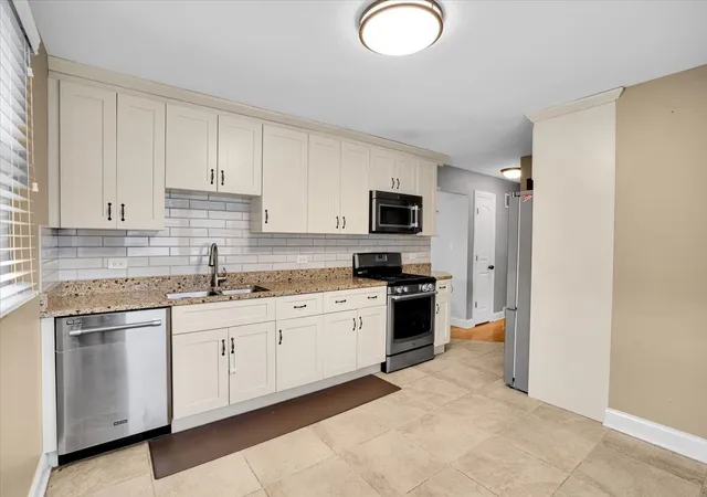 Photo 3 of Single family home for sale at 1402 S Robert Dr, Mount Prospect, IL 60056 | MLS# 12755729 | Listing updated on 2026-10-06