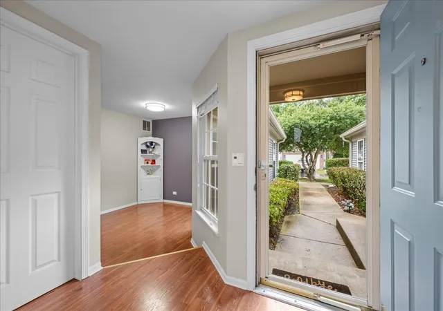 Photo 3 of Townhouse for sale at 877 Wembley Ct, Elgin, IL 60120 | MLS# 12755815 | Listing updated on 2026-09-14