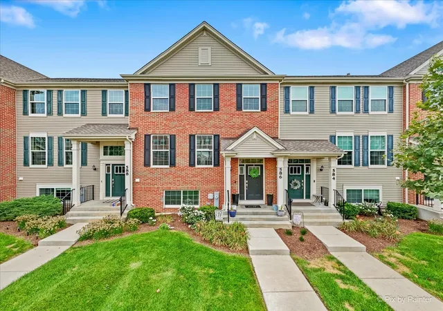 Photo 1 of Townhouse for sale at 586 Cimmaron Cir, Crystal Lake, IL 60012 | MLS# 12755820 | Listing updated on 2026-09-13