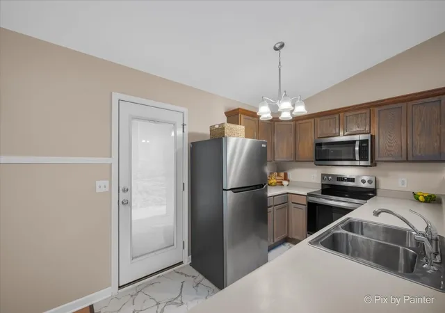 Photo 3 of Townhouse for sale at 1519 Stonefield Dr, De Kalb, IL 60115 | MLS# 12756081 | Listing updated on 2026-09-13