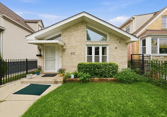 Single family home for sale at 6237 S Tripp Ave, Chicago, IL 60629 | MLS# 12756089