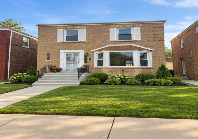 Single family home for sale at 10048 S Rhodes Ave, Chicago, IL 60628 | MLS# 12756145