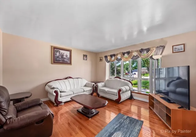 Photo 2 of Single family home for sale at 401 Longford Dr, Elgin, IL 60120 | MLS# 12756708 | Listing updated on 2026-09-16