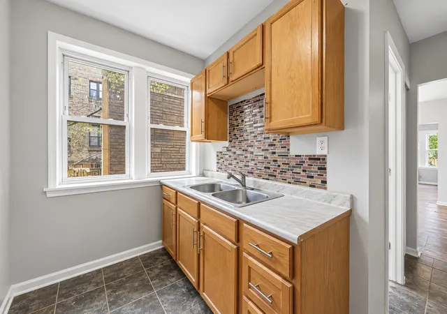 Photo 3 of Multi family home for sale at 7949 S Marquette Ave, Chicago, IL 60617 | MLS# 12756972 | Listing updated on 2026-09-16