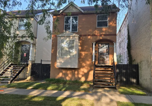 Multi family home for sale at 6941 S Cornell Ave, Chicago, IL 60649 | MLS# 12757147
