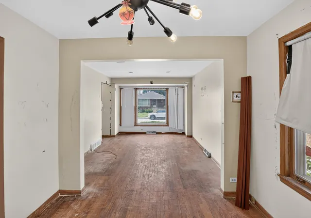 Photo 4 of Single family home for sale at 13609 S Atlantic Ave, Riverdale, IL 60827 | MLS# 12757578 | Listing updated on 2026-09-28