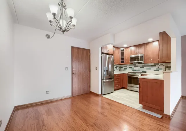 Listing Photo 3 - Condo for sale in building located at 7707 W Irving Park Rd, Chicago, IL 60634 - Unit #202