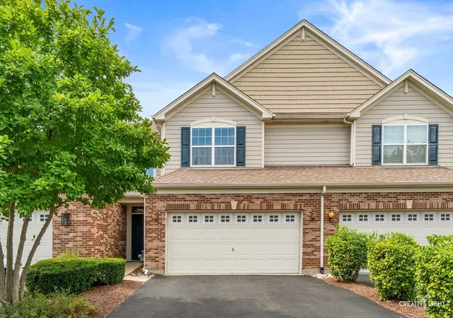 Townhouse for sale at 1209 John Hancock Dr, Bolingbrook, IL 60490 | MLS# 12758238